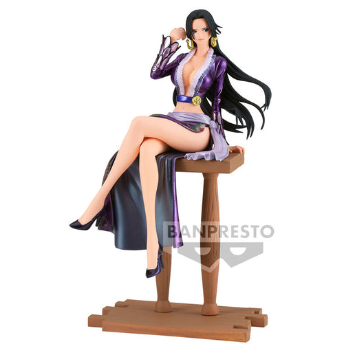 Beautiful statue of Boa Hancock from the legendary anime ONE PIECE. This figure is launched by Banpresto as part of their latest DXF Special collection.   The creator did a smashing job creating this piece, showing Boa Hancock posing elegantly in her purple outfit, and sitting on a tall bench. (Bench is included). - Truly amazing !   This PVC statue stands at 16cm tall, bench included, and packaged in a gift/collectible box from Bandai. 