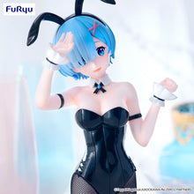 Load image into Gallery viewer, Rem Steps Into the Spotlight
Bring one of Re:Zero’s most beloved characters to your collection with this impressive Rem BiCute Bunnies Figure by FuRyu.
Inspired by Re:Zero − Starting Life in Another World, Rem swaps her familiar maid outfit for the distinctive BiCute Bunnies look, creating a completely different display piece for fans of the series. Her signature blue hair and instantly recognisable character design are paired with a sleek black bunny outfit, matching cuffs, bow tie and bunny ears.
Standi