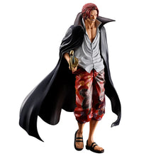 Load image into Gallery viewer, The Legendary Red-Haired Emperor Takes Centre Stage
Bring the commanding presence of one of the most influential pirates in the One Piece universe to your collection with this spectacular Shanks Masterlise Expiece Figure from Bandai Spirits.
Standing approximately 21cm tall, this officially licensed collectible captures Red-Haired Shanks, captain of the Red Hair Pirates and one of the legendary Four Emperors of the Sea.
With his distinctive red hair, confident smile, flowing black cape and legendary sword
