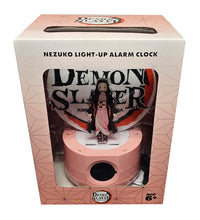 Load image into Gallery viewer, Free UK Royal Mail Tracked 24hr delivery  Official Demon Slayer Nezuko Kamado alarm clock. This amazing clock display is launched by TEKNOFUN as part of their latest collection.   The stand has a huge Demon Slayer panel in the background, beautiful acrylic display of Nezuko, and the LED clock also display the room temperature. - Truly amazing !   Display: Time / Date / Room Temperature / Set alarm   USB Connection  Size: 22cm   Official brand: TEKNOFUN  Excellent gift for any Demon Slayer fan.  Age: 6+ 
