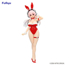 Load image into Gallery viewer, Free UK Royal Mail Tracked 24hr delivery
Stunning statue of Super Sonico, she is known as the mascot for Nitroplus' annual live music festival event "Nitro Super Sonico". This amazing figure is launched by Good Smile Company as part of their latest BiCute Bunnies collection.
This statue is created in beautiful fashion, showing Super Sonico posing beautifully in her red and white BiCute bunnies outfit. -Stunning!
This PVC statue stands at 30cm tall and packaged in a gift/collectible box from Good Smile