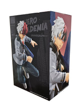 Load image into Gallery viewer, Cool figure of Shoto Todoroki from the popular anime My Hero Academia. This figure is launched by Banpresto as part of their latest BRAVEGRAPH collection. - Vol.2.   This statue is created in immense detail, showing Shoto Todoroki posing in his uniform, with his shoulder bag - in motion. - Stunning !   This PVC statue stands at 14cm tall, and packaged in a gift/collectible box from Bandai.  Official brand: Banpresto / Bandai 
