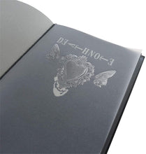 Load image into Gallery viewer, This Death Note notebook is created in detail to resemble the exact notebook from the classic anime Death Note. A Beautiful white quill pen is included and the set is packaged in gift box and also includes a Death Note book marker. PVC black leather cover, with all the rules included adapted directly from the Anime. Excellent notepad for writing journals, diary, scripts, and sketches. Amazing gift for any Death Note fans.