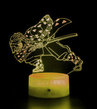 Load image into Gallery viewer, Free UK Royal Mail Tracked 24hr delivery. Combining art and technology makes this 3D visual effect lamp a perfect gift for anime fans. The acrylic design produces an optical 3D hologram effect which brings the anime character to life. The base has a touch sensor which makes it simple to control all the seven colour lighting modes. The set also includes a remote control for you to control the lamp with ease. "The art challenges the technology, and the technology inspires the art".