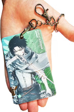 Load image into Gallery viewer, Free UK Royal Mail 24hr delivery  Beautiful crafted Attack On Titan Card holder with keyring. DTG high quality design of Levi Ackerman, adapted from the popular anime Attack On Titan.  The card holder is made of High-quality PVC plastic with a smooth matt finish. The card holder can be used for storing bank cards/student cards/and other ID cards.  Size: 6.7cm x 11cm (Approx) Can store up to three regular size credit cards.  Excellent gift for any Attack On Titan fan.
