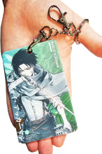 Load image into Gallery viewer, Free UK Royal Mail 24hr delivery Beautiful crafted Attack On Titan Card holder with keyring. DTG high quality design of Levi Ackerman, adapted from the popular anime Attack On Titan. The card holder is made of High-quality PVC plastic with a smooth matt finish. The card holder can be used for storing bank cards/student cards/and other ID cards. Size: 6.7cm x 11cm (Approx) Can store up to three regular size credit cards. Excellent gift for any Attack On Titan fan.