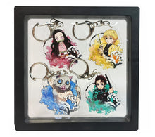 Load image into Gallery viewer, Free UK Royal Mail 24hr delivery Cool set of Demon Slayer keychains. Premium design DTG quality acrylic keyrings. The main acrylic panel stands at 6cm (approx), and 4mm (approx) thickness. 4 piece set, and packaged in a cute see-through pouch. Keychain 1: Zenitsu Agatsuma Keychain 2: Nezuko Kamado Keychain 3: Tanjiro Kamado Keychain 4: Inosuke Hashibira