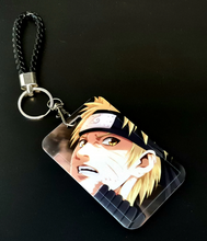 Load image into Gallery viewer, Free UK Royal Mail 24hr delivery Beautiful crafted Naruto Card holder with keyring. DTG high quality design of Naruto Uzumaki is adapted from the popular anime Naruto. The card holder is made of High-quality PVC plastic with a smooth matt finish. The card holder can be used for storing bank cards/student cards/and other ID cards. Premium leather rope keyring is also included. Excellent gift for any Naruto fan. Size: Size: 6.7cm x 11cm (Approx) Can store up to three regular size credit cards.
