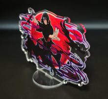 Load image into Gallery viewer, Free Royal Mail 24hr delivery. Beautiful Acrylic stand of Itachi Uchiha from the popular anime series Naruto. High-quality DTG print design showing the main Character Itachi Uchiha posing in battle mode. Height: 12.5cm x 15cm Thickness: 3mm Excellent gift for any Naruto fan.