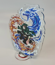 Load image into Gallery viewer, Free Royal Mail 24hr delivery Striking Demon Slayer anime acrylic stand of the brother and sister duo (Tanjiro and Nezuko Kamado) from the popular anime series Demon Slayer. High-quality DTG print design showing Tanjiro and Nezuko posing in battle mode. Height: 11.5cm x 15.5cm Thickness: 3mm Excellent gift for any Demon Slayer fan.