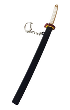 Load image into Gallery viewer, Free UK Royal Mail 24hr delivery  Beautiful crafted Demon Slayer Hashira keyring.  The keyring is made from high-quality zinc alloy.  Kyōjurō Rengoku Katana model Keyring.  Full length: 15cm
