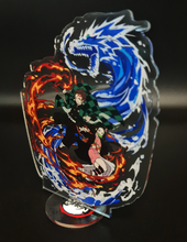 Load image into Gallery viewer, Free Royal Mail 24hr delivery Striking Demon Slayer anime acrylic stand of the brother and sister duo (Tanjiro and Nezuko Kamado) from the popular anime series Demon Slayer. High-quality DTG print design showing Tanjiro and Nezuko posing in battle mode. Height: 11.5cm x 15.5cm Thickness: 3mm Excellent gift for any Demon Slayer fan.