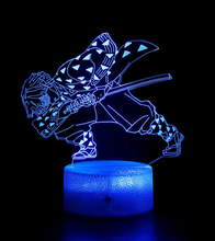 Load image into Gallery viewer, Free UK Royal Mail Tracked 24hr delivery. Combining art and technology makes this 3D visual effect lamp a perfect gift for anime fans. The acrylic design produces an optical 3D hologram effect which brings the anime character to life. The base has a touch sensor which makes it simple to control all the seven colour lighting modes. The set also includes a remote control for you to control the lamp with ease. "The art challenges the technology, and the technology inspires the art".