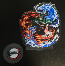 Load image into Gallery viewer, Free Royal Mail 24hr delivery Striking Demon Slayer anime acrylic stand of the brother and sister duo (Tanjiro and Nezuko Kamado) from the popular anime series Demon Slayer. High-quality DTG print design showing Tanjiro and Nezuko posing in battle mode. Height: 11.5cm x 15.5cm Thickness: 3mm Excellent gift for any Demon Slayer fan.