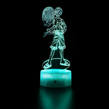 Load image into Gallery viewer, Free UK Royal Mail Tracked 24hr delivery. Combining art and technology makes this 3D visual effect lamp a perfect gift for anime fans. The acrylic design produces an optical 3D hologram effect which brings the anime character to life. The base has a touch sensor which makes it simple to control all the seven colour lighting modes. The cracked transparent design of the base of the lamp increases the visual effect compared to the regular black plastic base.