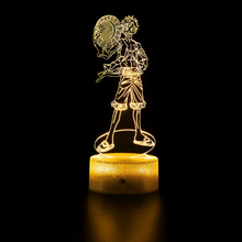 Load image into Gallery viewer, Free UK Royal Mail Tracked 24hr delivery. Combining art and technology makes this 3D visual effect lamp a perfect gift for anime fans. The acrylic design produces an optical 3D hologram effect which brings the anime character to life. The base has a touch sensor which makes it simple to control all the seven colour lighting modes. The cracked transparent design of the base of the lamp increases the visual effect compared to the regular black plastic base.