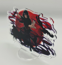 Load image into Gallery viewer, Free Royal Mail 24hr delivery. Beautiful Acrylic stand of Itachi Uchiha from the popular anime series Naruto. High-quality DTG print design showing the main Character Itachi Uchiha posing in battle mode. Height: 12.5cm x 15cm Thickness: 3mm Excellent gift for any Naruto fan.