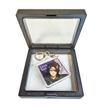Load image into Gallery viewer, Free UK Royal Mail 24hr delivery  Attacl On Titan - Hange Zoe keychain.  Premium design DTG quality acrylic keyring packaged in a window display gift box.  The main acrylic panel of the keyring stands at 5cm (approx), and 4mm (approx) thickness.  Excellent gift for any Attack On Titan fan. 
