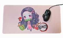 Load image into Gallery viewer, Extended Mouse Pad excellent for gaming or general office use. The mouse mat measures at 30x60cm and fit perfectly to most desk sizes. Striking image of Demon Slayer design. The premium thick design of this mouse pad allows your mouse to obtain excellent speed and control (non slip rubber base).