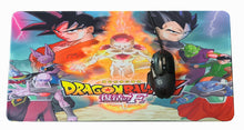 Load image into Gallery viewer, Extended Mouse Pad excellent for gaming or general office use. The mouse mat measures at 30x60cm and fit perfectly to most desk sizes. Striking image of Dragon Ball design. The premium thick design of this mouse pad allows your mouse to obtain excellent speed and control (non slip rubber base).