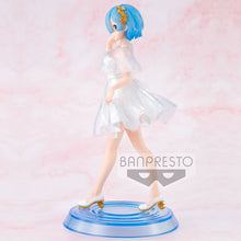 Load image into Gallery viewer, Free UK Royal Mail Tracked 24hr delivery.  Beautiful figure of Rem, from the amazing anime series Re:Zero Starting Lift in Another World. This figure is launched by Banpresto as part of their latest Serenus Couture series.   The statue is absolutely stunning, showing Rem posing in a white dress, with a golden floral hair clip.   The PVC figure stands at 20cm tall and packaged in a gift/collectible box from Bandai. 
