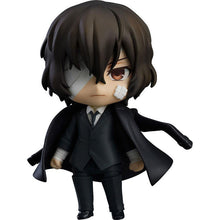 Load image into Gallery viewer, Free UK Royal Mail Tracked 24hr Delivery This premium nendoriod figure of Osamu Dazai from the popular anime series Bungo Stray Dogs is launched by GOOD SMILE this year as part of their latest Nendoroid series (1748). The set comes with the nendoriod figure Osamu Dazai, three face plates (standard/shock/smile). There is also various interchangeable hand parts to recreate all kinds of poses, includes his gun and a cup of coffee.