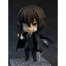 Load image into Gallery viewer, Free UK Royal Mail Tracked 24hr Delivery   This premium nendoriod figure of Osamu Dazai from the popular anime series Bungo Stray Dogs is launched by GOOD SMILE this year as part of their latest Nendoroid series (1748).   ﻿The set comes with the nendoriod figure Osamu Dazai, three face plates (standard/shock/smile). There is also various interchangeable hand parts to recreate all kinds of poses, includes his gun and a cup of coffee. 
