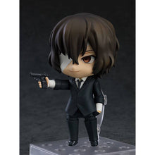 Load image into Gallery viewer, Free UK Royal Mail Tracked 24hr Delivery This premium nendoriod figure of Osamu Dazai from the popular anime series Bungo Stray Dogs is launched by GOOD SMILE this year as part of their latest Nendoroid series (1748). The set comes with the nendoriod figure Osamu Dazai, three face plates (standard/shock/smile). There is also various interchangeable hand parts to recreate all kinds of poses, includes his gun and a cup of coffee.