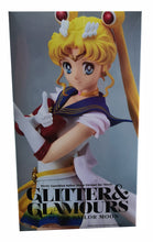Load image into Gallery viewer, Free UK Royal Mail Tracked 24hr delivery Beautiful striking figure of Sailer Moon, adapted from the the latest movie "Sailer Moon Eternal". This statue is launched by Banpresto and TOEI ANIMATION as part of their latest Glitter and Glamours series. The statue of this beauty is created flawlessly, showing Sailer Moon posing in her legendary uniform. This PVC figure stands at 23cm tall, and packaged in a premium collectible/gift box from Bandai. Version: A