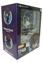 Load image into Gallery viewer, Free UK Royal Mail Tracked 24hr Delivery This premium nendoriod figure of Osamu Dazai from the popular anime series Bungo Stray Dogs is launched by GOOD SMILE this year as part of their latest Nendoroid series (1748). The set comes with the nendoriod figure Osamu Dazai, three face plates (standard/shock/smile). There is also various interchangeable hand parts to recreate all kinds of poses, includes his gun and a cup of coffee.