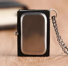 Load image into Gallery viewer, Free UK Royal Mail Tracked 24hr delivery 

Beautiful design of Death Note Mini Clock Pendant Necklace. 

The Pendant is designed beautifully with the logo engraved into the front of the pendant. The front panel opens and reveals a beautiful analogue mini clock inside, and the Death Note message on the clock. - Adapted beautifully, direct from the anime. 

Material: Metallic stainless steel

Size: 4cm x 3cm x 1.5cm (Pendant) / 40cm (Necklace chain) 

Packaged in a window display gift box. 

Excellent gift fo
