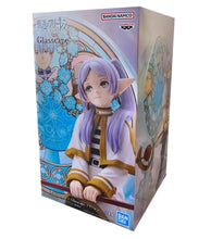 Load image into Gallery viewer, Free UK Royal Mail Tracked 24hr delivery 

Beautiful statue of Frieren from the popular anime Frieren: Beyond Journeys End. This amazing statue is launched by Banpresto as part of their latest Glasscap collection.

This statue is created fabulously, showing Frieren posing elegantly sitting on her seat, holding her staff, reminiscing about the old days in front of the beautiful circular decorated window. - Stunning! 

This PVC statue stands at 15cm tall, and packaged in a gift/collectible box from Bandai.

O
