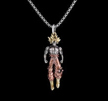 Load image into Gallery viewer, Free UK Royal Mail Tracked 24hr delivery 

Stunning Dragon Ball Z anime pendant necklace of Super Saiyan Son Goku.

The pendant is designed beautifully with a smooth finish showing Son Goku in his Super Saiyan form. 

Material: Stainless metal alloy (Pendent) 

Size: Pendant (5cm) / Necklace (50cm) 

Giftbox - Included

Excellent gift for any Dragon Ball fan.
