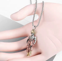 Load image into Gallery viewer, Free UK Royal Mail Tracked 24hr delivery 

Stunning Dragon Ball Z anime pendant necklace of Super Saiyan Son Goku.

The pendant is designed beautifully with a smooth finish showing Son Goku in his Super Saiyan form. 

Material: Stainless metal alloy (Pendent) 

Size: Pendant (5cm) / Necklace (50cm) 

Giftbox - Included

Excellent gift for any Dragon Ball fan.
