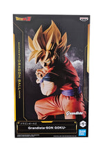 Load image into Gallery viewer, Free UK Royal Mail Tracked 24hr delivery  

Remarkable statue of Super Saiyan Son Goku from the legendary anime Dragon Ball Z. This figure is launched by Banpresto as part of their latest Grandista series. 

The creator did a smashing job with this piece, showing Son Goku in his Super Saiyan form, and ready to unleash his primary move. - Stunning! 

This PVC statue stands at 22cm tall, and packaged in a gift collectible box from Bandai. 

Official brand: Banpresto / Bandai 

EAN: 4983164288261
