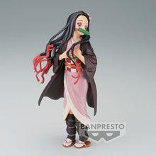 Load image into Gallery viewer, Free UK Royal Mail Tracked 24hr delivery   Beautiful statue of Nezuko Kamado from the popular anime Demon Slayer. This figure is launched by Banpresto as part of their latest Glitter and Glamour collection - Special Colour version.    The creator did an excellent job creating this piece, showing Nezuko posing elegantly in her pink kimono. - Stunning !   This PVC statue stands at 22cm tall, and packaged in a gift/collectible box from Bandai.
