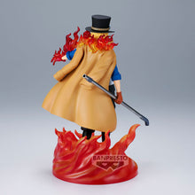 Load image into Gallery viewer, Free UK Royal Mail Tracked 24hr delivery 

Super cool statue of Sabo from the legendary anime ONE PIECE. This figure is launched by Banpresto as part of their latest &quot;The Shukko&quot; collection - Special Edition.

The creator completed this piece in excellent fashion, showing Sabo posing in his pirate uniform, holding his primary weapon (the iron pipe), and releasing fire around him. 

This PVC statue stands at 17cm tall, and packaged in a gift/collectible box from Bandai.

Official brand: Banpresto / Bandai 


