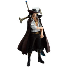 Load image into Gallery viewer, Free UK Royal Mail Tracked 24hr delivery 

Exceptional statue of Dracule Mihawk from the legendary anime ONE PIECE. This amazing statue is launched by Ichibansho Figure as part of their latest Masterlise collection. - The Trials. 

This remarkable statue is created meticulously, showing Dracule Mihawk posing in his  in his iconic long, black high-collared coat and with his primary weapon crucifix-shaped black blade on his back (Yoro). 

This PVC statue stands at 25cm tall, and packaged in a gift/collectible
