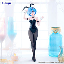 Load image into Gallery viewer, Rem Steps Into the Spotlight
Bring one of Re:Zero’s most beloved characters to your collection with this impressive Rem BiCute Bunnies Figure by FuRyu.

Inspired by Re:Zero − Starting Life in Another World, Rem swaps her familiar maid outfit for the distinctive BiCute Bunnies look, creating a completely different display piece for fans of the series. Her signature blue hair and instantly recognisable character design are paired with a sleek black bunny outfit, matching cuffs, bow tie and bunny ears.

Standi
