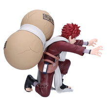 Load image into Gallery viewer, THE SAND KAZEKAGE UNLEASHES HIS POWER
Bring the formidable power of Gaara to your collection with this officially licensed Naruto Shippuden Vibration Stars Gaara II Figure, produced by Banpresto / Bandai Spirits.

Gaara is captured in a dramatic battle-ready pose, crouched low with both hands extended as though preparing to unleash his devastating sand techniques. His enormous sand gourd dominates the silhouette behind him, instantly making this one of the most recognisable Gaara designs.

The figure recrea

