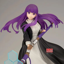Load image into Gallery viewer, Fern's Magic Takes Form
Bring the composed power of Fern to your collection with this officially licensed Frieren: Beyond Journey's End Effectreme Figure from Banpresto.

Fern is captured in the middle of casting magic, gripping her distinctive staff as her long purple hair and flowing black cloak sweep dramatically behind her. Her calm expression perfectly reflects the young mage's focused personality, creating a figure that feels powerful without needing an exaggerated pose.

The standout feature is the l
