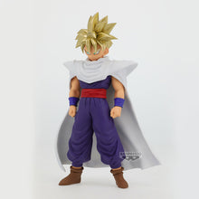 Load image into Gallery viewer, The Power of a Saiyan. The Legacy of Piccolo.
Celebrate the extraordinary power and determination of Son Gohan with this impressive Blood of Saiyans Figure from Banpresto and Bandai Spirits, inspired by the legendary anime series Dragon Ball Z.

Standing approximately 16cm tall, this officially licensed collectible captures Gohan in his iconic golden-haired Super Saiyan transformation, wearing the distinctive purple Demon Clan outfit and flowing white cape associated with his mentor, Piccolo.

With his pier

