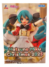 Load image into Gallery viewer, Christmas Comes to Life with Hatsune Miku
Celebrate the festive season with Hatsune Miku in this wonderfully cheerful Christmas 2025 Luminasta Figure by SEGA.

This seasonal version of the world-famous virtual singer gives Miku a charming Christmas makeover, featuring a beautifully detailed festive outfit with warm cream, red and brown tones. Her unmistakable turquoise twin-tails sweep dramatically around the figure, decorated with white accents that add even more character to the Christmas design.

Miku is
