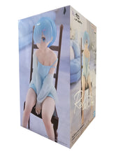 Load image into Gallery viewer, Free UK Royal Mail Tracked 24hr delivery 

Beautiful statue of Rem from the popular anime series &quot;Starting Life in Another World Re:Zero&quot;, this amazing figure is launched by Banpresto as part of their latest Relax Time Series.  

The statue shows Rem posing elegantly in her sky blue night gown sitting on her chair (chair included). The figure is created beautifully. - Truly stunning. 

This PVC figure stands at 20cm tall, and packaged in a premium gift/collectible box from Bandai. 
