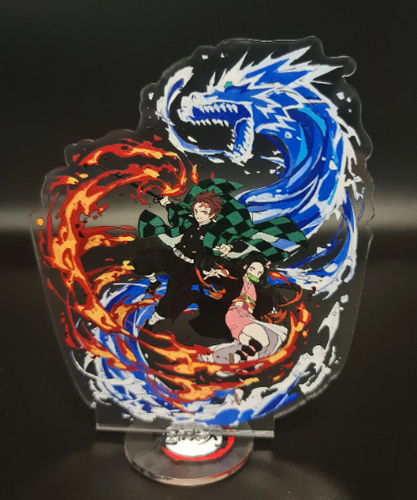 Free Royal Mail 24hr delivery  Striking Demon Slayer anime acrylic stand of the brother and sister duo (Tanjiro and Nezuko Kamado) from the popular anime series Demon Slayer.  High-quality DTG print design showing Tanjiro and Nezuko posing in battle mode.  Height: 11.5cm x 15.5cm Thickness: 3mm  Excellent gift for any Demon Slayer fan.